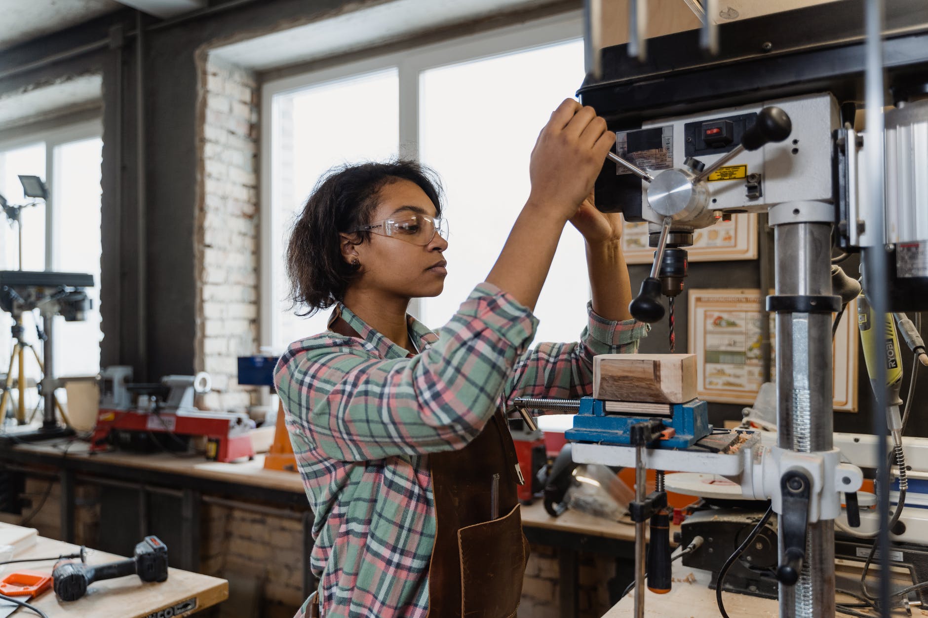 a woman doing carpentry