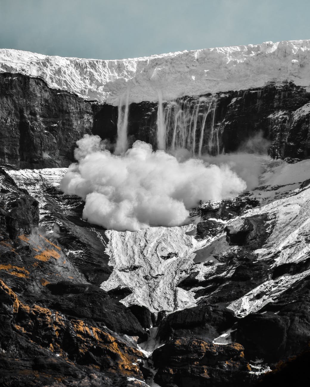 close up photo of snow avalanche on mountain