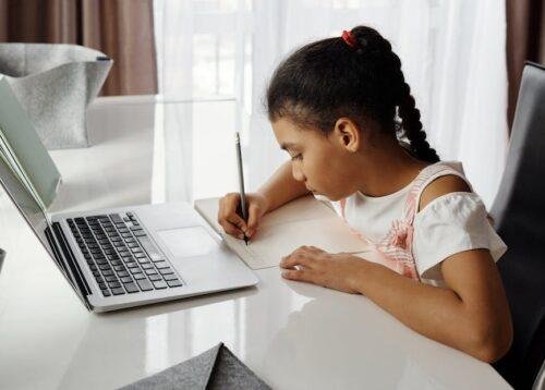 little girl doing her homework